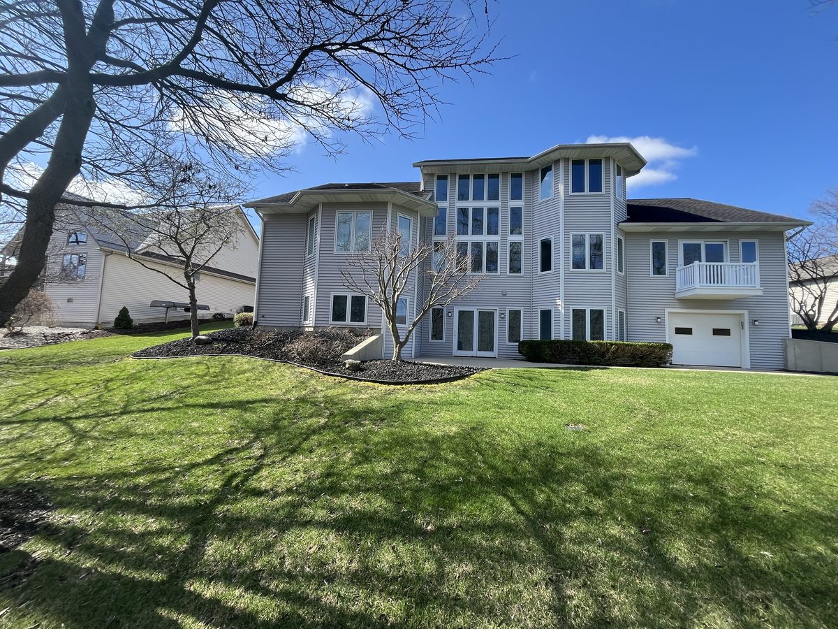 Large home with expansive windows we service
