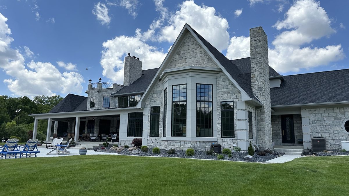 Stone estate home with covered porch